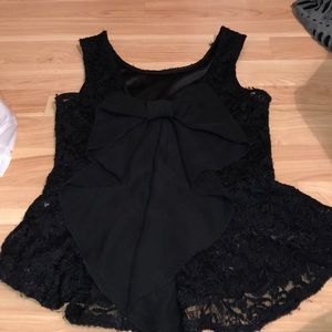 black lace tank top with a bow in the back